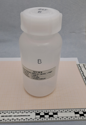 Photo of a QCY calibration solution in a PE bottle.